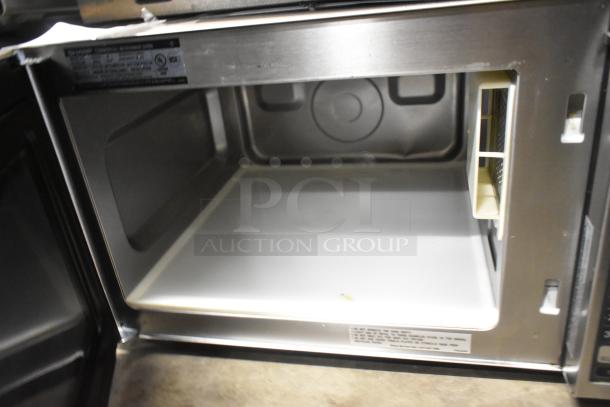2023 Sharp R-21LVF stainless steel commercial microwave oven, open view. 120 Volts, 1 Phase.