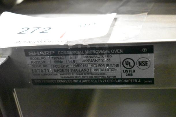 2023 Sharp R-21LVF stainless steel commercial countertop microwave oven, 120V, model details and certification labels shown.