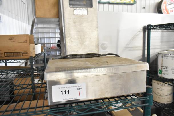 Silverline 3250 metal countertop scale in used condition. Runs on 115 volts, 1 phase. Visible auction label number 111.