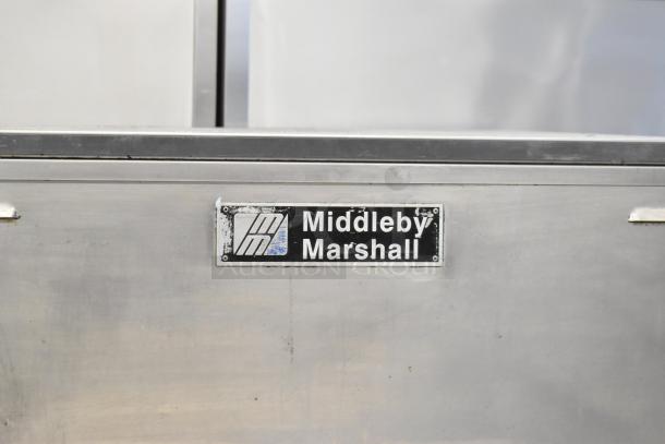 Middleby Marshall PS638G stainless steel conveyor pizza oven, commercial natural gas, on casters, model label visible.