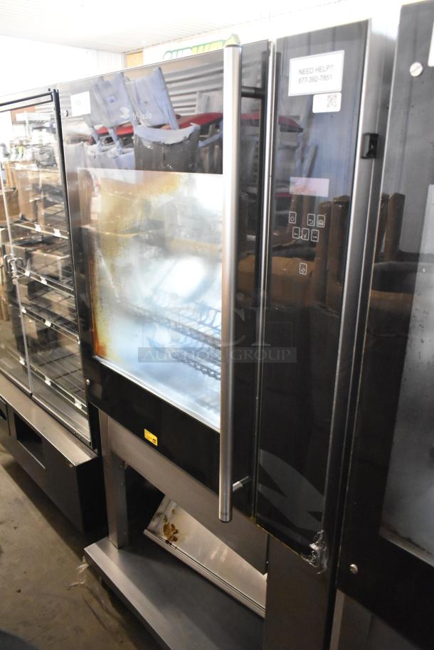 Fri-jado TDR7-P stainless steel commercial rotisserie oven, electric, on casters, 208V, 3-phase, visible digital controls.