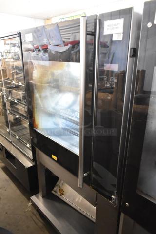 Fri-jado TDR7-P Stainless Steel Commercial Floor Style Electric Powered Rotisserie Oven on Commercial Casters. 208 Volts, 3 Phase. - Item #1217748