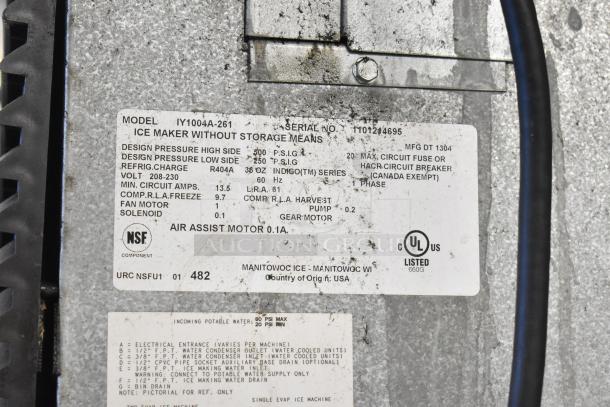 Manitowoc IY1004A-261 stainless steel commercial ice head label, detailing model, serial number, and specifications.