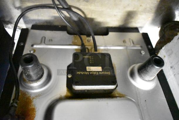 Merrychef commercial rapid cook oven interior, showing Secure Edge Module and power connections. 208/240V, 1 Phase.