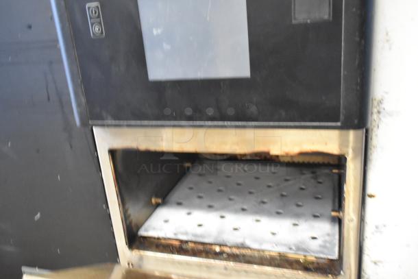 Merrychef commercial countertop rapid cook oven, metal, electric, 208/240V, 1 phase, showing internal cooking area.