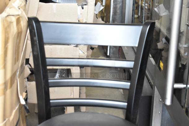 Bar-height chair with black wood pattern and black seat cushion. New, scratch and dent condition. Set of 40.