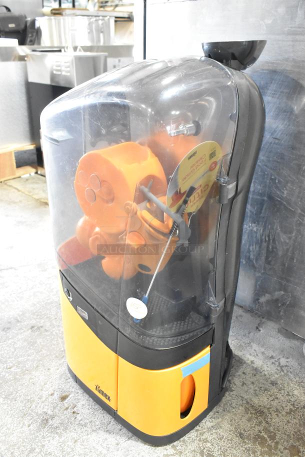 Zumex MINEX Metal Commercial Citrus Juicer, 2025 model, countertop style, 100-240V, 1 phase, clear cover, excellent condition.