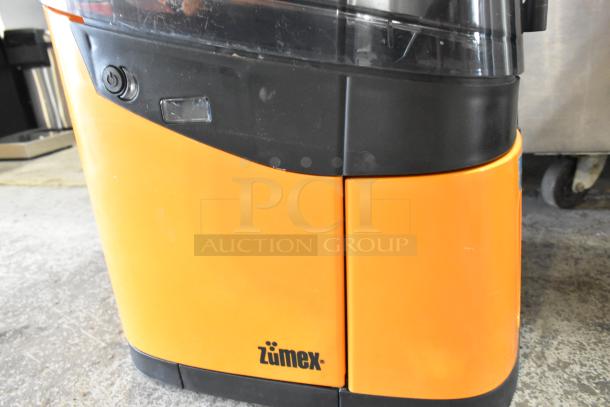 2025 Zumex MINEX Metal Commercial Citrus Juicer, orange/black, 100-240V, 1 Phase. Logo visible, used condition.