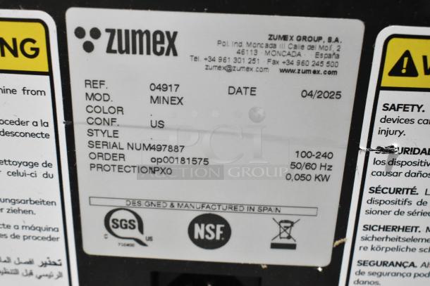 Zumex MINEX juicer label showing model details, voltage 100-240V, serial 497887, protection IPX0, made in Spain, NSF certified.