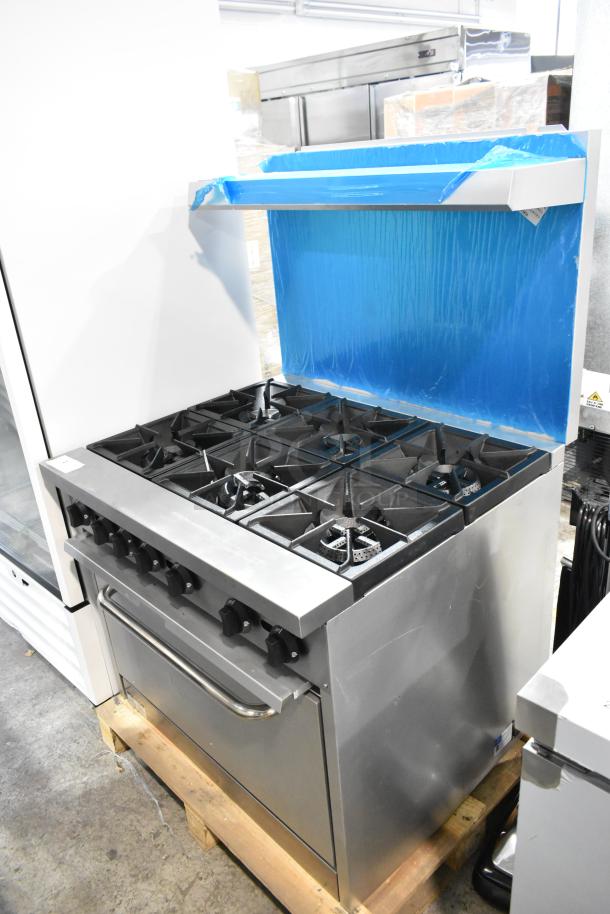 Brand new Mainstreet 541E36L stainless steel 36" range. Featuring 6 burners, liquid propane, oven, overshelf, and backsplash.