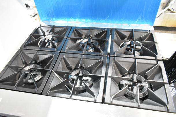 Brand new Mainstreet 541E36L commercial range, 6 burners, stainless steel, liquid propane, 36" with oven, 210,000 BTU.