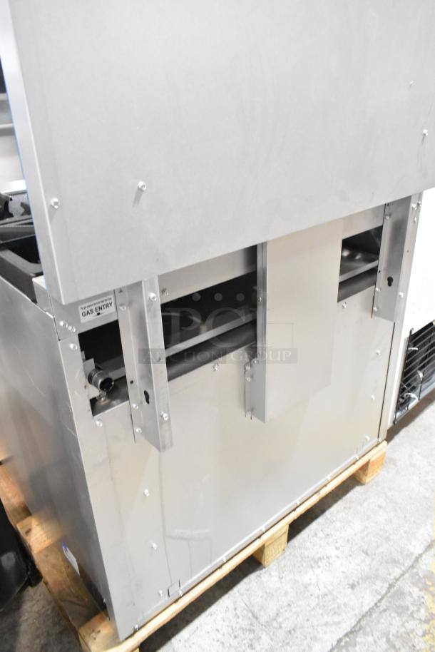 Stainless steel Mainstreet 541E36L 36" range, liquid propane, 6 burners, oven, overshelf, back splash, 210,000 BTU.