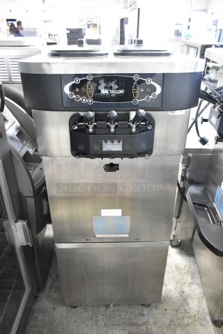 Taylor C723-33 Stainless Steel Commercial Floor Style Water Cooled 2 Flavor w/ Twist Soft Serve Ice Cream Machine on Commercial Casters. 208-230 Volts, 3 Phase. - Item #1200983