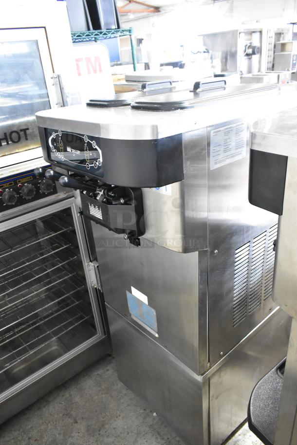 Taylor C723-33 stainless steel 2-flavor ice cream machine, water-cooled, on casters, 208-230V, 3-phase.