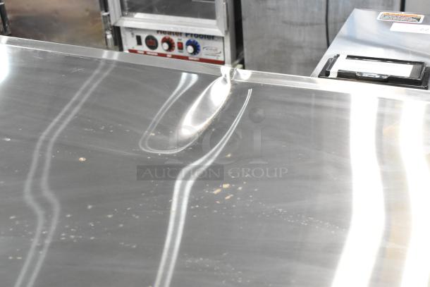 Brand new Avantco 178CBE52HC stainless steel 2-drawer chef base with visible scratch and dent. 115 Volts, 1 Phase.