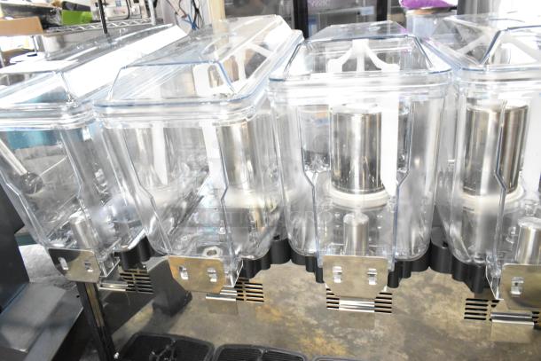 Brand new Carnival King Coldream 4M, stainless steel, 4-bowl beverage dispenser, 115V, 1 Phase. Scratch and dent condition.