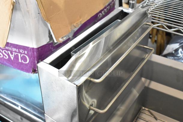Stainless steel CPG 351FFOP40N commercial fryer with open pot design and two metal fry baskets, slightly dented. 90,000 BTU.