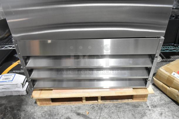 Brand new Avantco 829BMR23F stainless steel single door freezer with poly-coated racks; minor cosmetic dents visible.