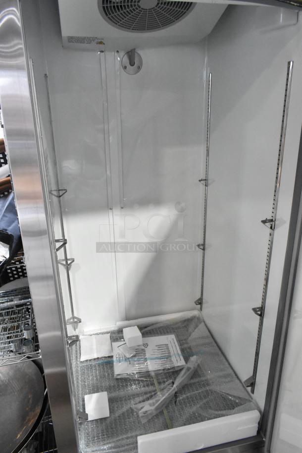 Brand new Avantco 829BMR23F stainless steel single-door freezer, poly-coated racks, 115V, slight scratches visible.