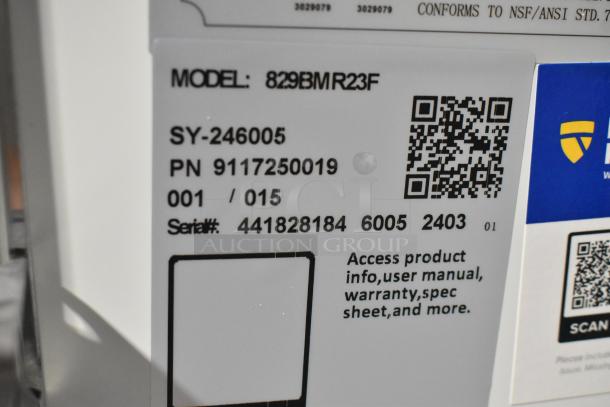 Label showing Avantco model 829BMR23F with serial number, QR codes, and warranty info for a stainless steel commercial freezer.
