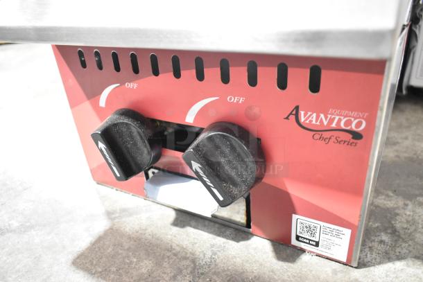 Brand new Avantco 177CAGR212 stainless steel 2-burner range, natural gas, 25,000 BTU, with minor scratches and dents.