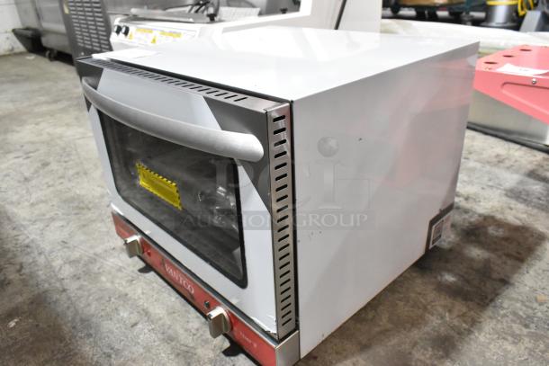 Brand new Avantco 177CO14 stainless steel countertop convection oven, 0.8 cu. ft., 120V, with minor scratches.