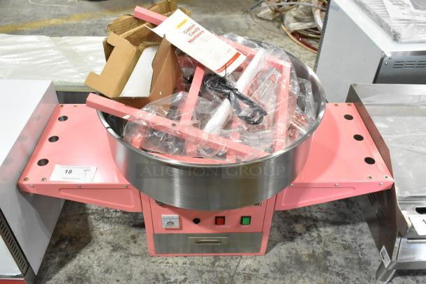 Brand new 2025 Carnival King 382CCM21CT cotton candy machine with 21" stainless steel bowl and cart; missing axle for wheels.