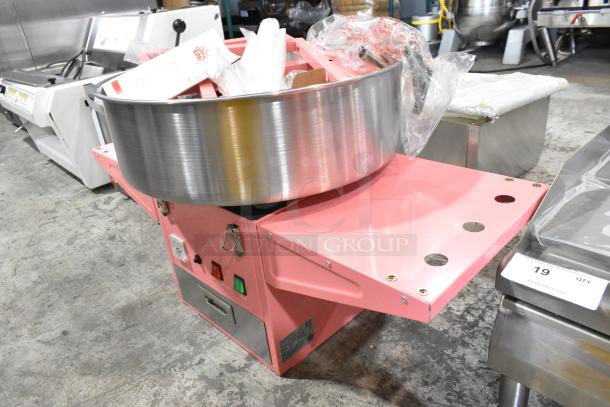 BRAND NEW 2025 Carnival King cotton candy machine, model 382CCM21CT, 21" stainless bowl, pink cart. Scratch and dent, missing axle for wheels.