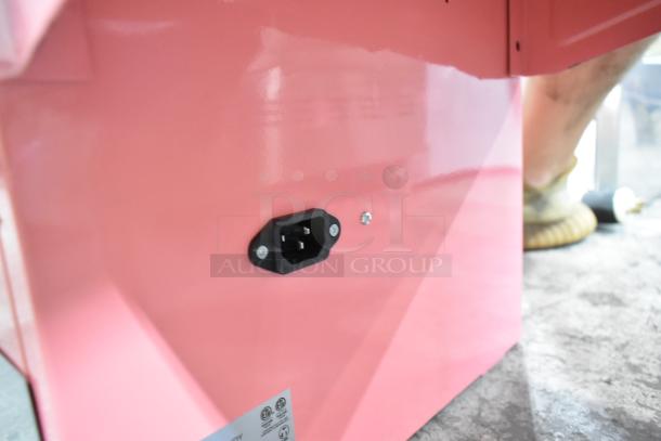 BRAND NEW SCRATCH AND DENT 2025 Carnival King 382CCM21CT cotton candy machine with missing axle; close-up of power inlet.