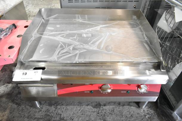 Brand new Avantco 177EG24N stainless steel countertop electric griddle, flat top, 208-240V, slight scratches, includes knobs and controls.