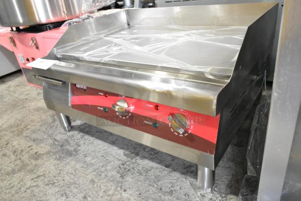 Brand new Avantco 177EG24N stainless steel electric countertop griddle, 208-240V. Scratch and dent condition.