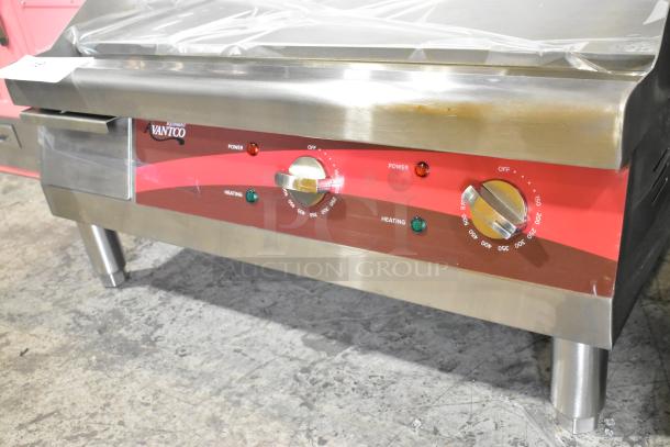 Brand new Avantco 177EG24N stainless steel electric flat top griddle, 208-240V, with minor scratches and dents, clear labels.
