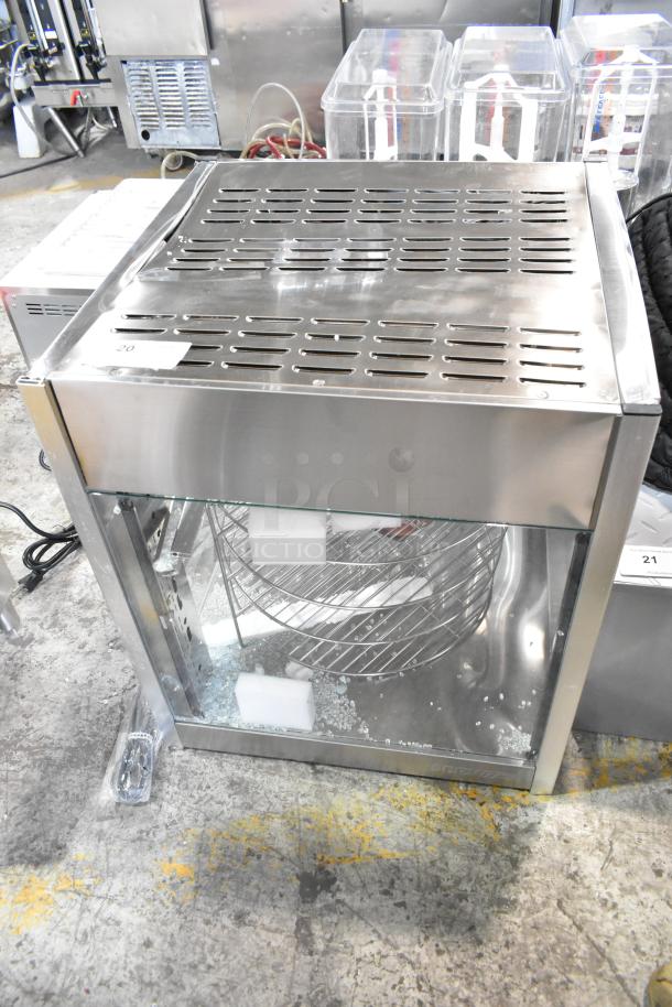 ServIt 423PDW18D1 stainless steel pizza warmer with 4-shelf rotating rack. Note: broken glass visible. 120V, 1 phase.