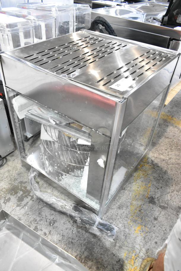 Brand new ServIt 423PDW18D1 stainless steel pizza warmer with broken glass. Features 4-shelf rotating rack. 120V, 1 phase.