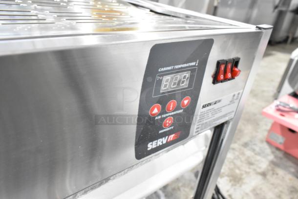 ServIt 423PDW18D1 stainless steel pizza warmer, 18", 4-shelf, digital display. Brand new with broken glass, 120V.
