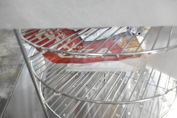 Brand new ServIt 423PDW18D1 pizza warmer, 18" stainless steel, 4-shelf rotating rack, visible broken glass, 120V, 1 phase.