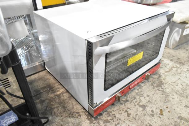 Brand new Avantco 177CO16 stainless steel half-size countertop convection oven, 1.5 cu. ft., minor scratches, 120 volts, 1 phase.