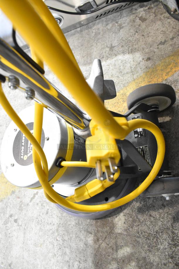 Brand new Lavex DP-1334 heavy duty floor cleaning machine, 120 volts, 1 phase. Yellow cord and visible labels.