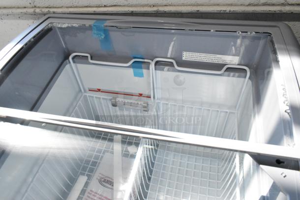 KoolMore MCF-6C 26 in. display ice cream freezer on casters, broken glass sliding door. 115 Volts, 1 Phase, new condition.