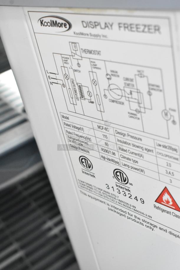 KoolMore MCF-6C model label showing voltage 115V, 60Hz frequency, refrigerant R290, ETL certification, and design specs.