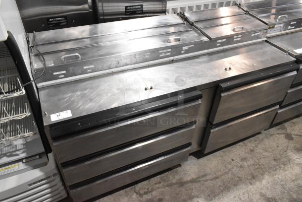 Silver King SKPZ72D stainless steel pizza prep table with 5 drawers, 115 volts, in commercial condition.