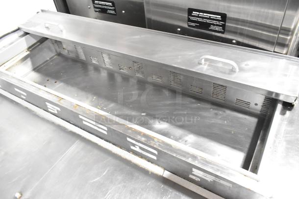 Silver King SKPZ72D stainless steel pizza prep table with 5 drawers, 115V, 1 phase, commercial use, shows minor wear.