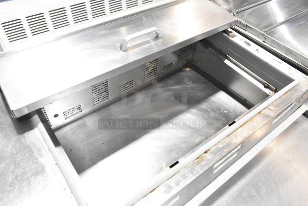 Silver King SKPZ72D stainless steel pizza prep table, open drawer view. Features 5 drawers, 115 volts, 1 phase.