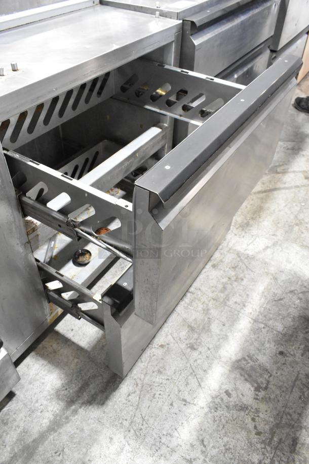 Silver King SKPZ72D stainless steel pizza prep table with 5 drawers, open drawer view, 115 volts, 1 phase, commercial use.