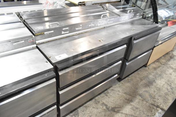Silver King SKPZ72D stainless steel pizza prep table with 5 drawers. 115V, 1 phase. Includes visible labels for organization.