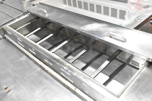 Silver King SKPZ72D stainless steel pizza prep table with 5 drawers, open view, showing storage compartments, 115V, 1 phase.