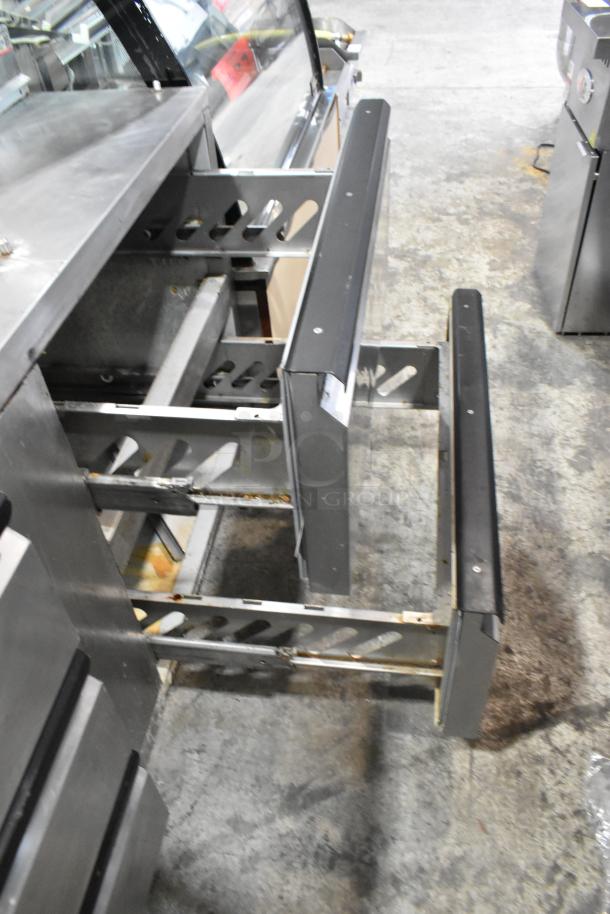 Silver King SKPZ72D stainless steel pizza prep table, 5 drawers, commercial use, visible wear, 115 volts, 1 phase.