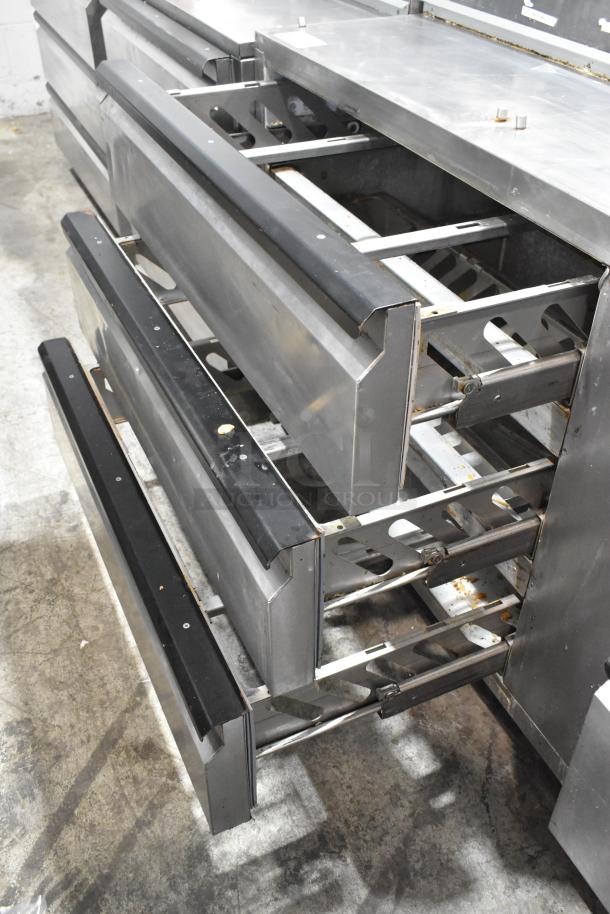 Silver King SKPZ72D stainless steel pizza prep table with 5 open drawers, commercial use, 115 volts, 1 phase.