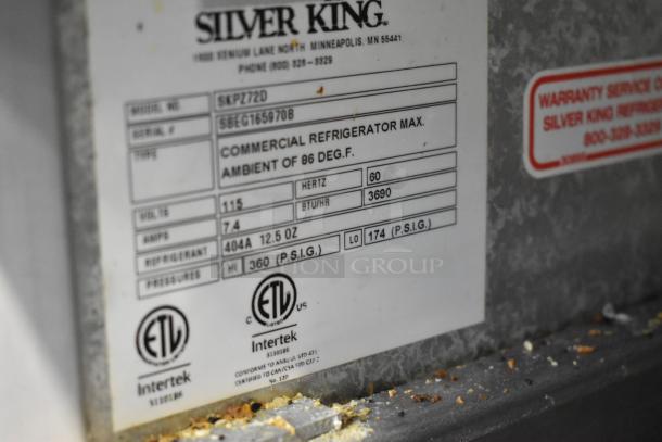 Silver King SKPZ72D stainless steel pizza prep table label, model specifications, and electrical details.