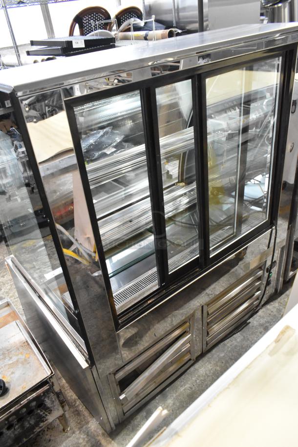 Cooltech commercial floor-style refrigerated display case. Features broken glass on side. 120 volts, 1 phase.